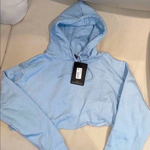 Blue cropped hoodie, brand new with tags!
